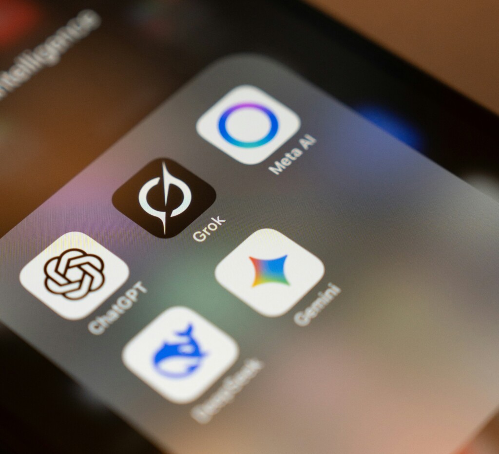 Smartphone screen displaying top AI apps like ChatGPT, Grok, Gemini, Claude, and Meta AI – perfect for small business automation in 2026​