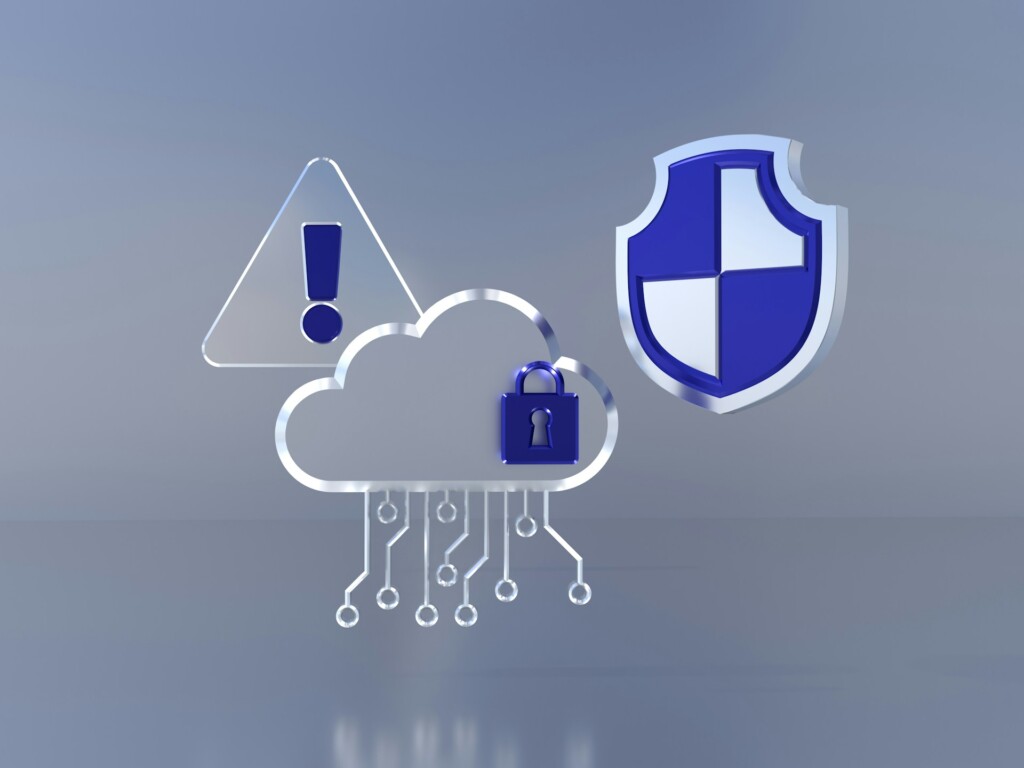 Illustrated cloud icon with locks and circuits representing machine identities, warning triangle for security risks, and protective shield for zero-trust defense in 2026 cloud environments.​